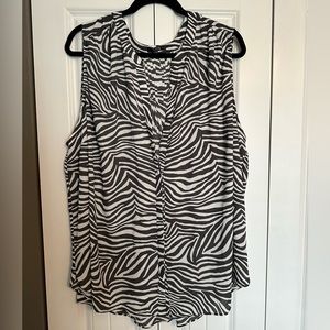 Grey Zebra Print NYDJ sleeveless blouse. Button front. “Metro zebra” print.
